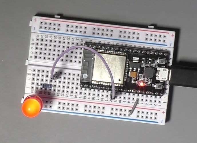 A simple ESP32 project blink an LED with a digital output pin